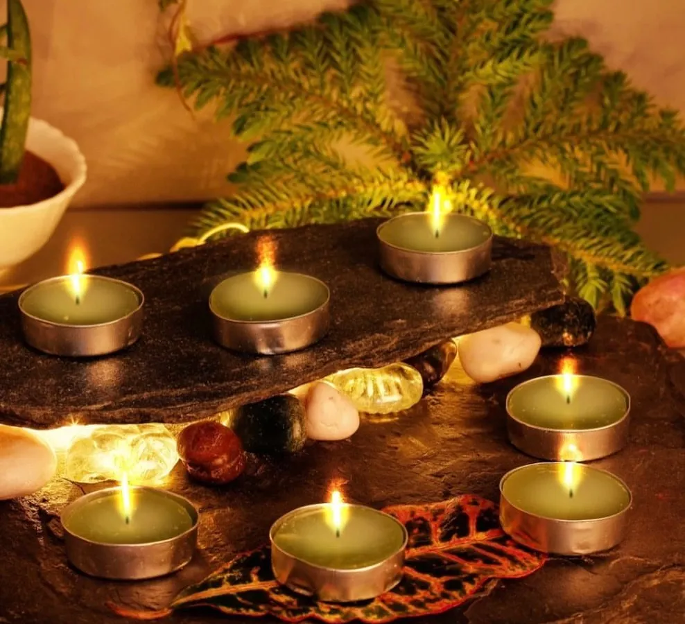 Here you can see my scented tealight candles creating a warm and peaceful ambiance. They are perfect for setting a relaxing mood, for meditation, or for your daily pooja rituals.