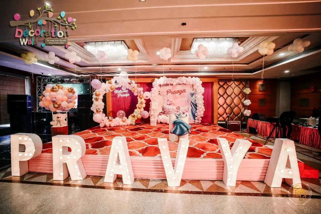 For little Pravya's welcome ceremony, we created a magical Cinderella world. The main stage featured her name in lights, a beautiful balloon ring for photos, and soft pastel colors to make it feel like a real fairytale. I love making these dream themes come to life.