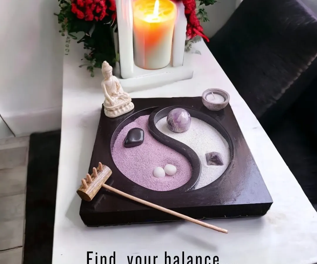 Find your balance with this desktop Zen garden. The Yin Yang design represents harmony, and raking the dual-colored sand around the amethyst crystal is a simple, meditative practice to center your thoughts.