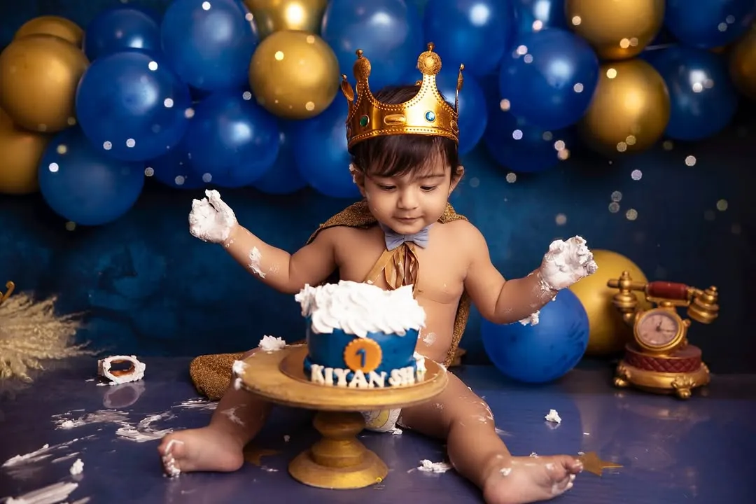 A cake fit for a little king! This royal-themed cake smash was all about celebrating his first year with playful mess and majestic fun. I love capturing the pure delight as they dig in for the first time.