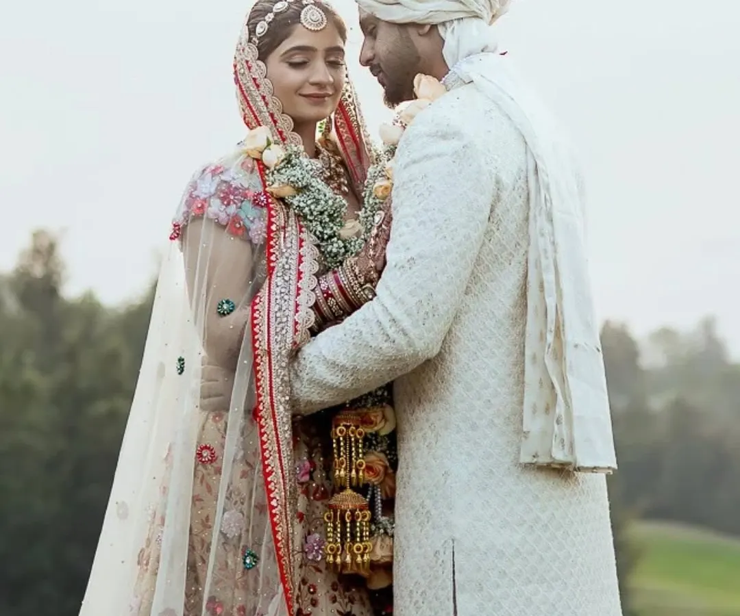 In a place where dreams come true, two people found their forever. This isn't just a portrait; it's the story of a love that feels like home, captured against the stunning backdrop of the Oxford Golf Resort in Pune.