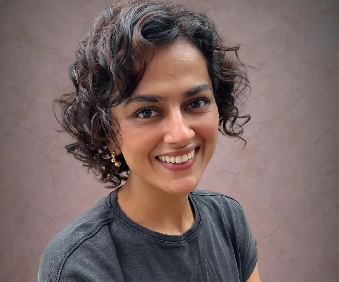 A new cut and color should make you feel amazing. Here is Shraddha looking radiant after I refreshed her curly bob with subtle Pintura highlights to add dimension and life to her natural texture.