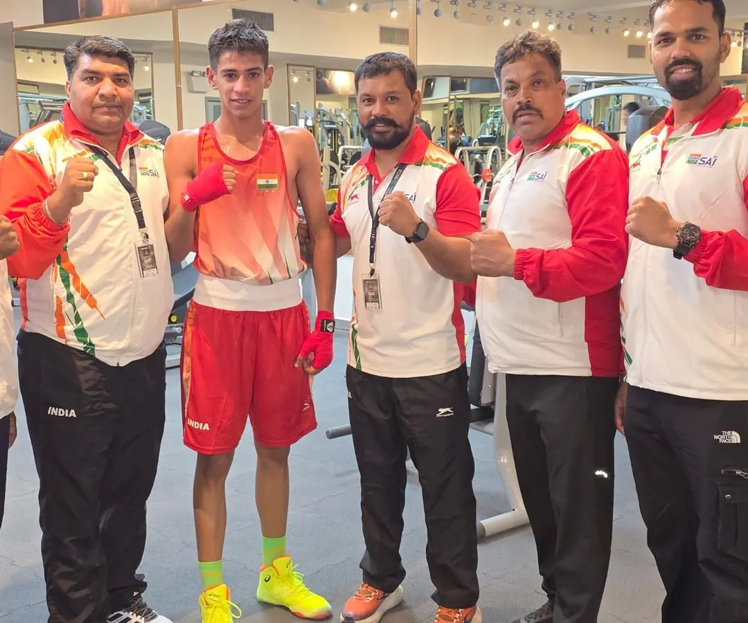 I am proud to have trained champions at every level. Here I am with Youth World Champion Sachin Siwach and my fellow coaches. My methods are proven to build not just fitness, but the skill and mindset of a competitive boxer.
