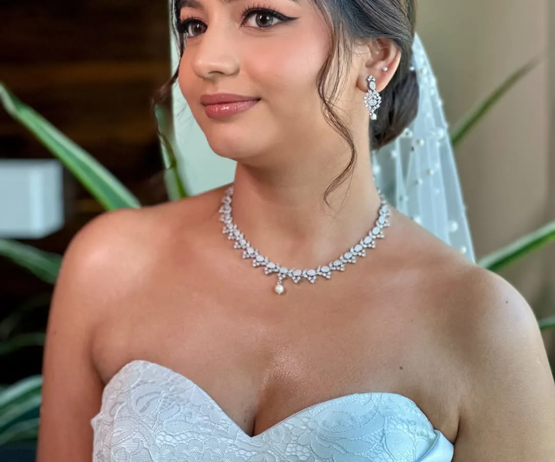The angelic glow of a Christian bride. For Beracah, we created a soft glam look with gentle features and luminous skin, ensuring her natural grace was the highlight of her wedding day look.