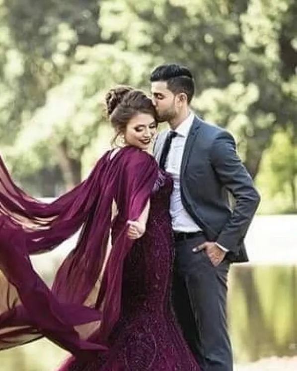 Create your dream pre-wedding photoshoot with our collection of flying gowns. This deep purple gown features a flowing cape that catches the air perfectly, ensuring your photos are nothing short of magical.