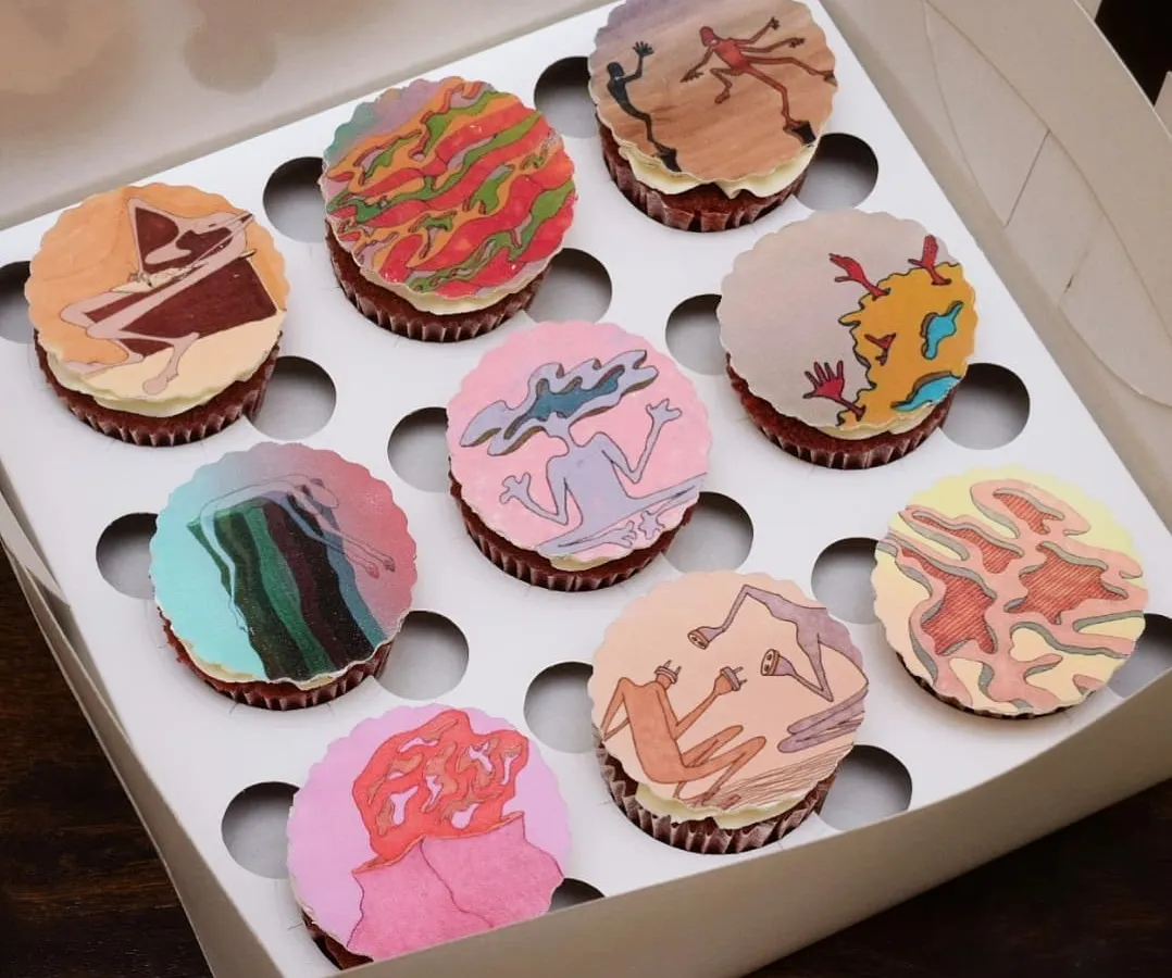 This project was so special. I got to turn a client's friend's original abstract art into a set of completely edible cupcake toppers. Seeing art you know on a cupcake just hits different, and it makes for an incredibly personal gift.