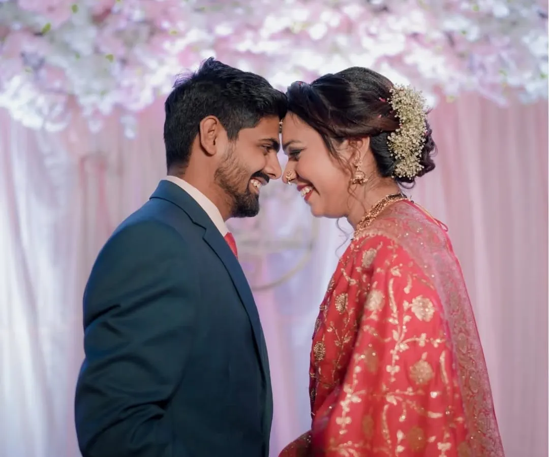 An intimate moment between the couple during their reception. I aim to capture the unscripted smiles and laughter that truly define your relationship, creating candid portraits you will cherish forever.