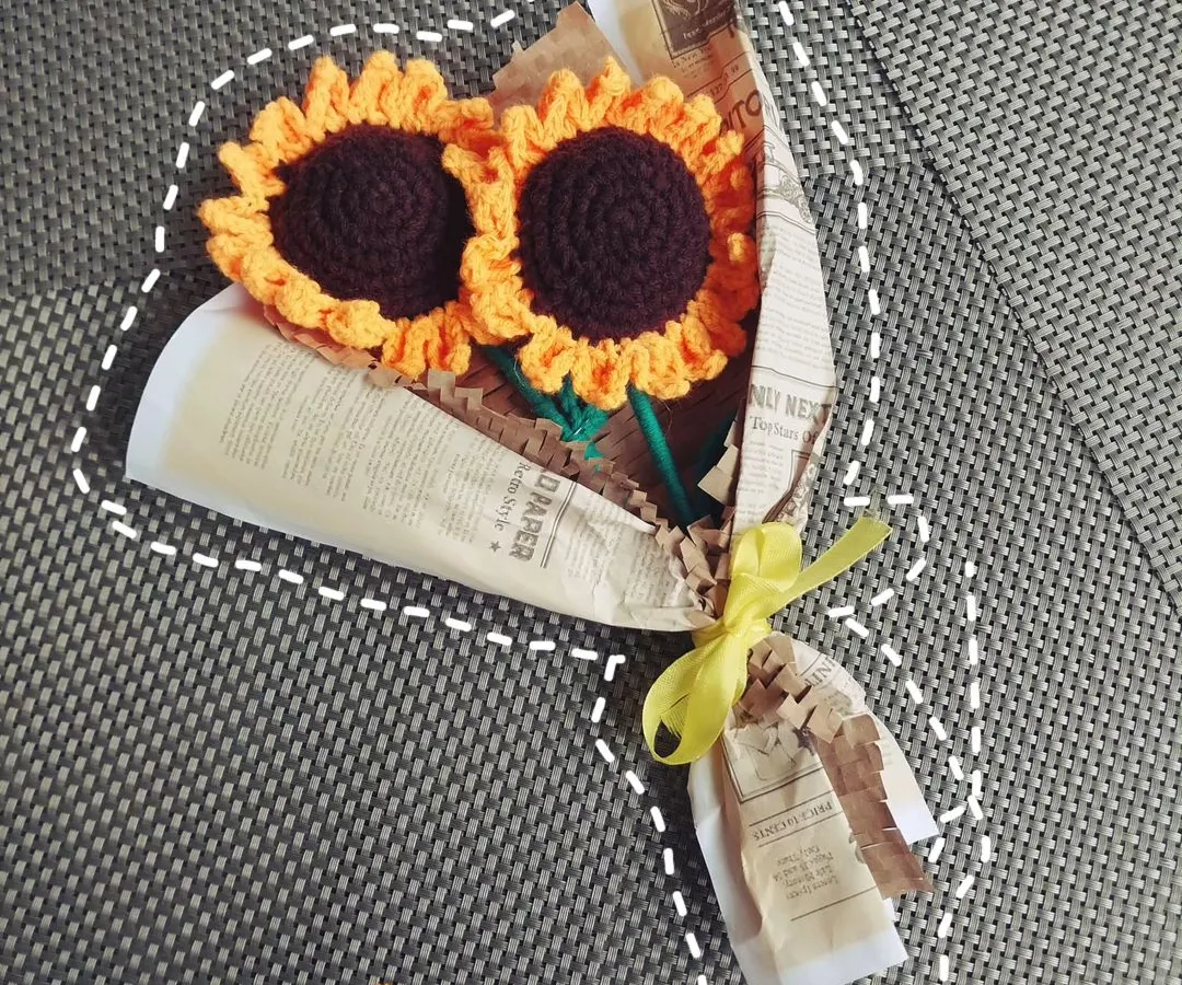 Brighten someone's day with a handmade crochet sunflower bouquet that lasts forever. Each flower is crafted with care, making it a perfect, timeless gift for any occasion.