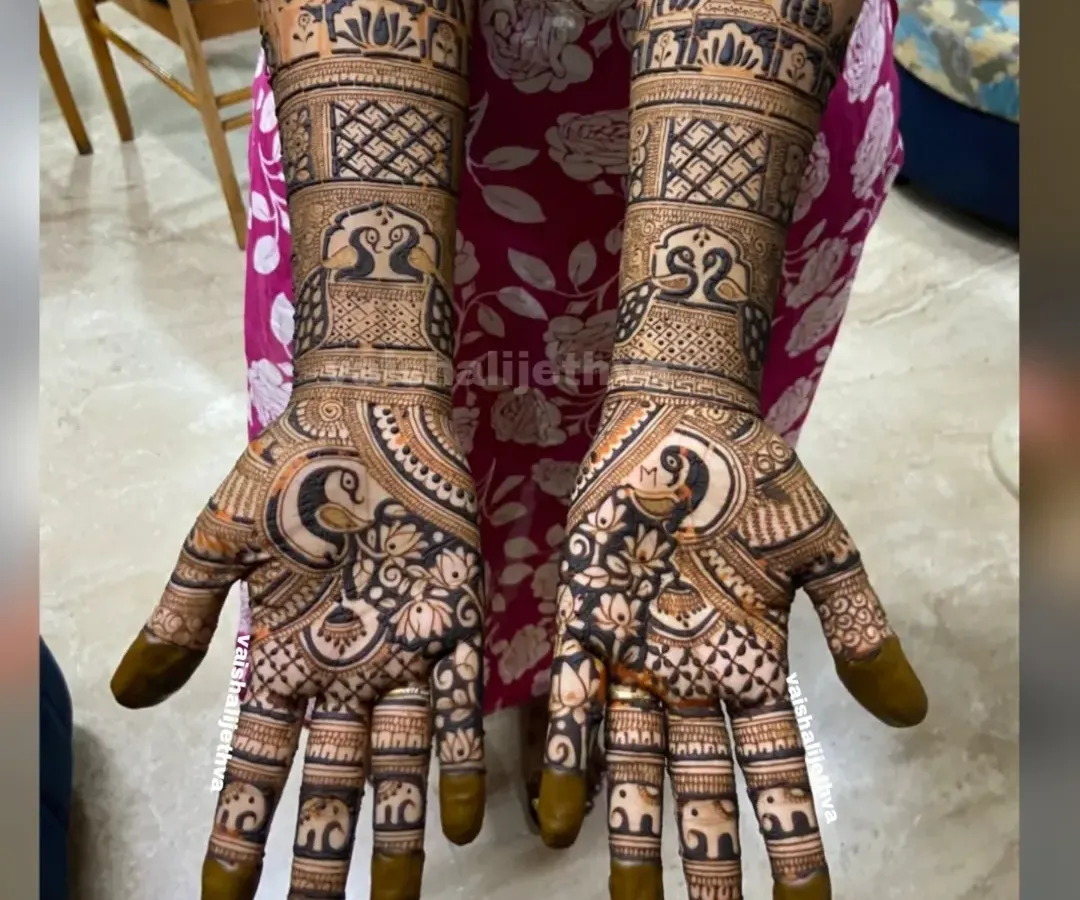 This is the kind of stunning, professional-level work my students can create after completing the course. This full-hand bridal design features detailed palace architecture, peacock motifs, and tiny elephants, showcasing advanced finishing techniques.