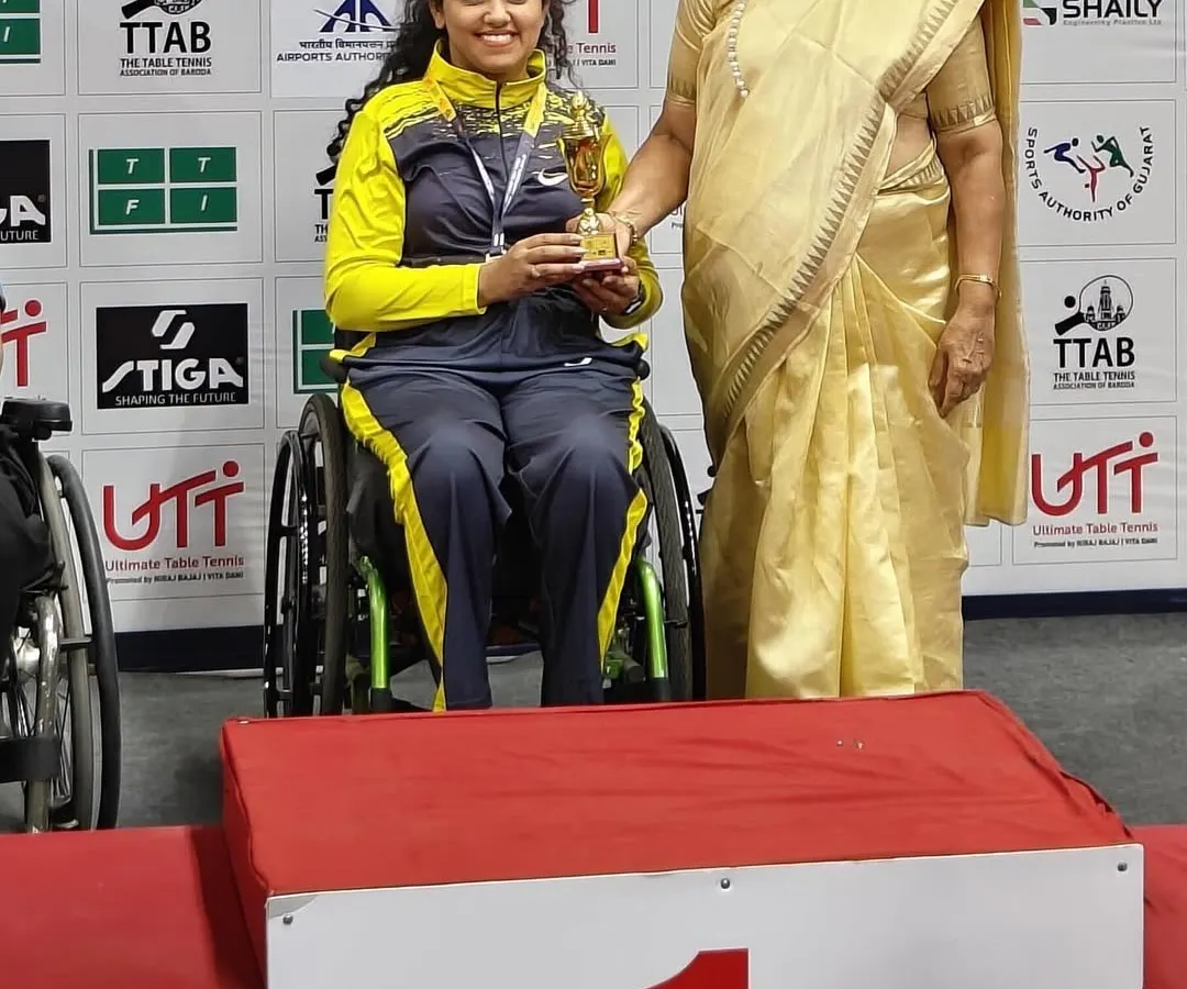 Reaching the top of the podium is our goal. This is Rajlakshmi S J being recognized as the National Champion in the women's singles category, a testament to our tournament-focused coaching program.