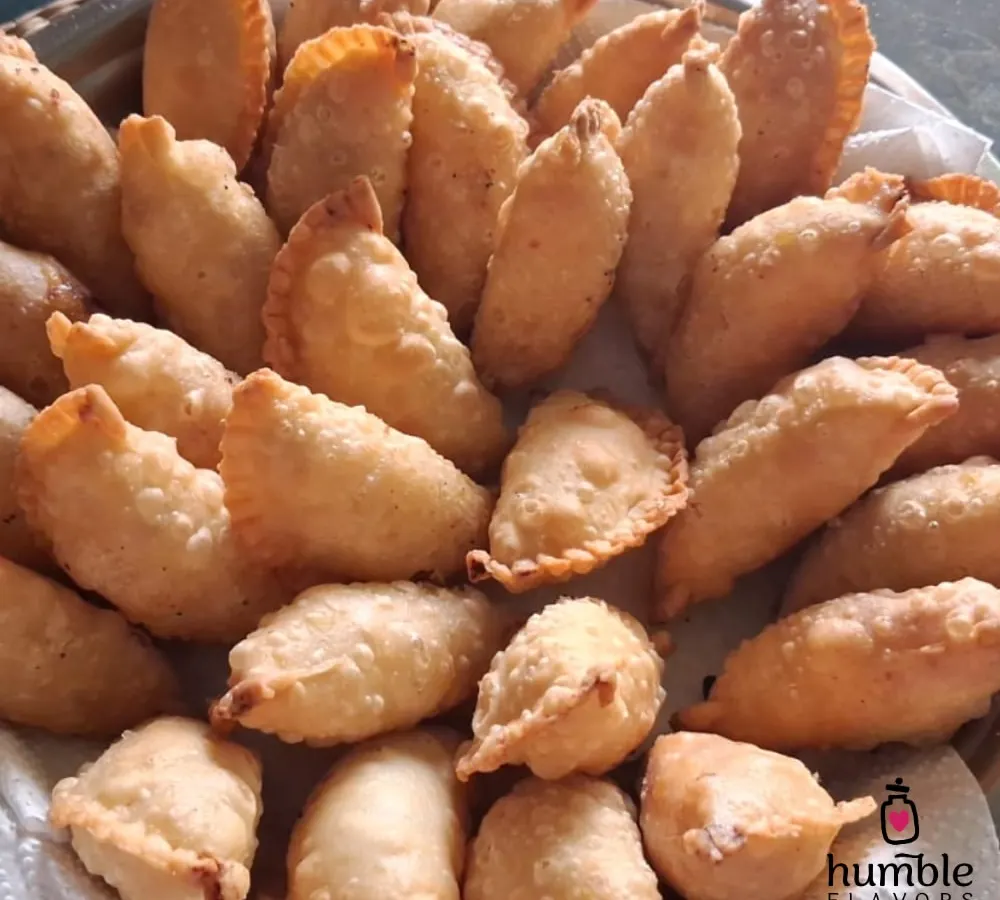 This is a tray full of happiness, my pure Mawa Gujiyas, fresh out of the kitchen. Every year for Holi, I handcraft hundreds of boxes of this traditional sweet. It’s a festive favorite that shows how timeless recipes, when made with care, are always loved and celebrated.