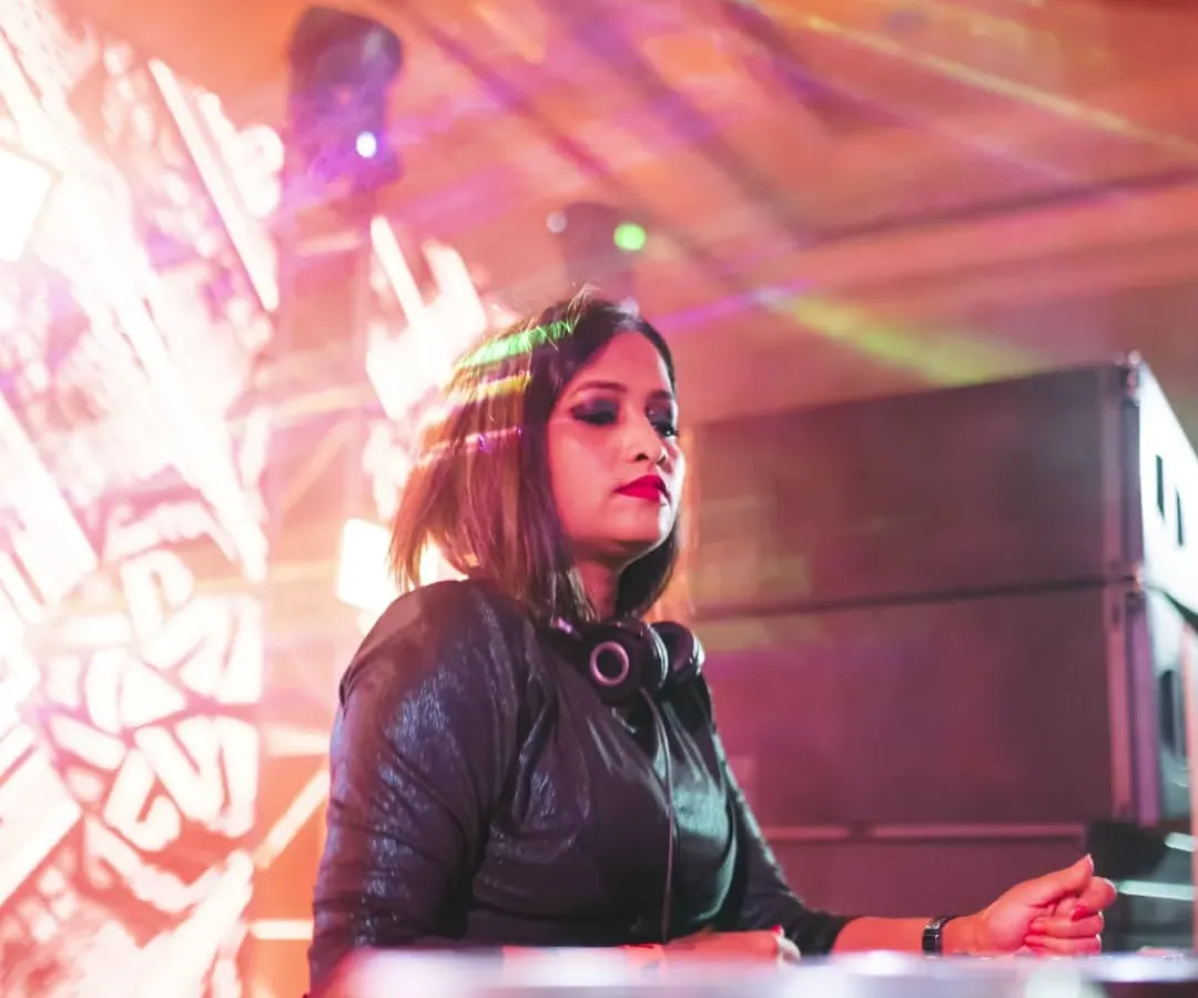 In the zone at The Ritz-Carlton, Bangalore. This shot captures my focus while playing for a massive event with an all-female lineup. I bring a professional setup and a deep library of tracks, perfect for high-end events and festivals that demand quality sound.
