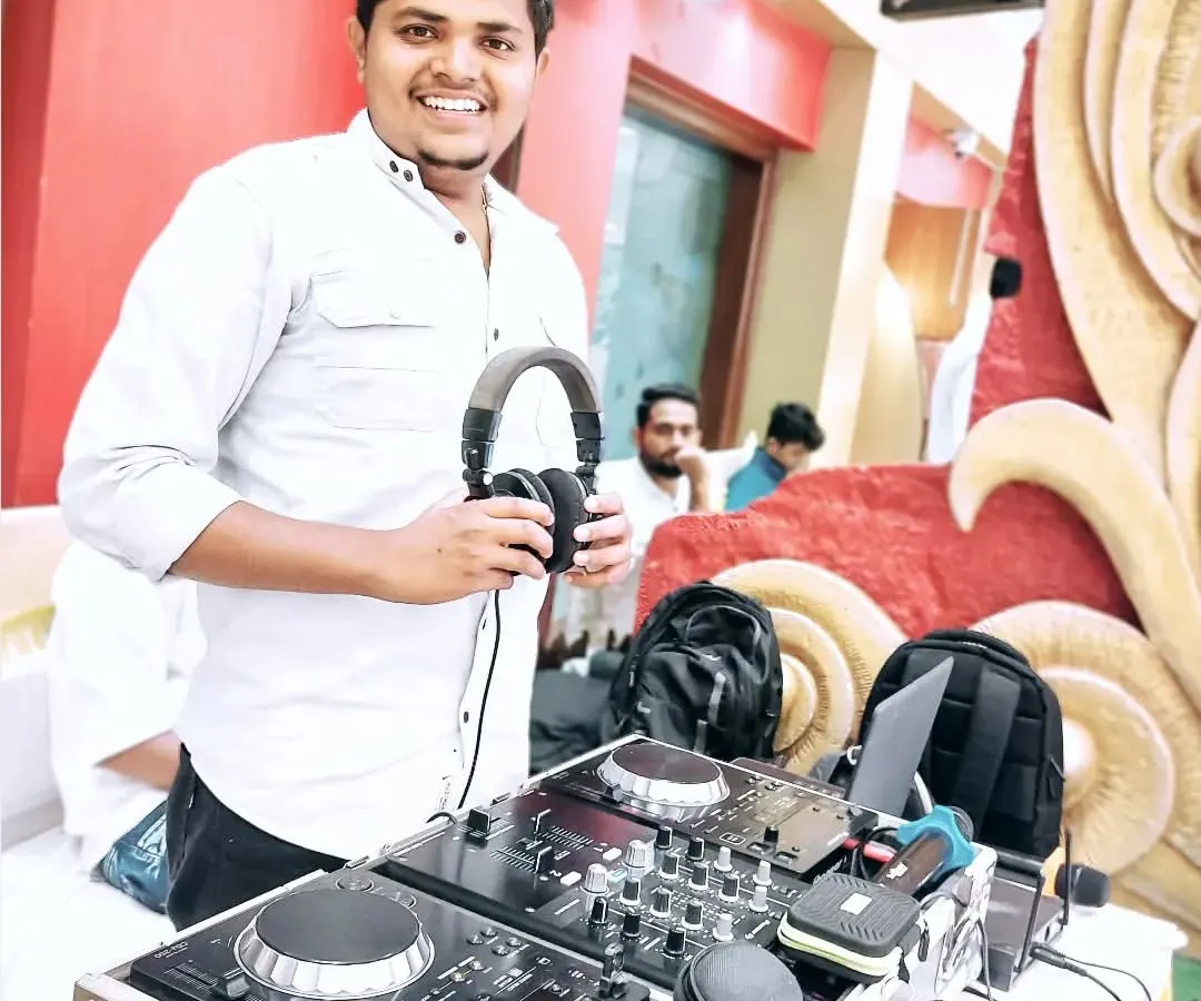 Ready to get the party started at a wedding event. I always come prepared with my professional Pioneer DJ setup to deliver the best sound and a seamless music experience for your special day.