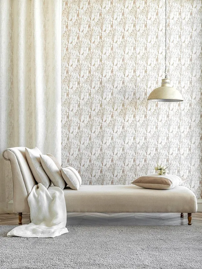 Here, I matched a heavy, floor-length cream curtain with the room's sophisticated decor. The thick fabric provides excellent light blocking and adds a touch of luxury, perfectly complementing the elegant chaise lounge and patterned wallpaper. This is a great example of how I help you select drapery that completes your room's aesthetic.