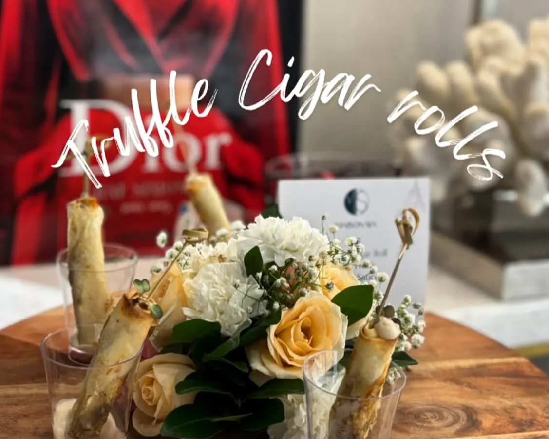 My signature Truffle Cigar Rolls are a true indulgence. Each roll is a crisp, golden shell filled with a creamy, aromatic truffle mixture, served elegantly to delight your guests.