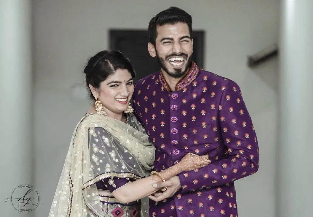 Capturing pure, unscripted joy is what I love most. This candid shot from a couple's portrait session shows a moment of genuine laughter, reflecting their unique connection. My approach is to create a relaxed atmosphere where you can be yourselves, allowing for authentic wedding photography.