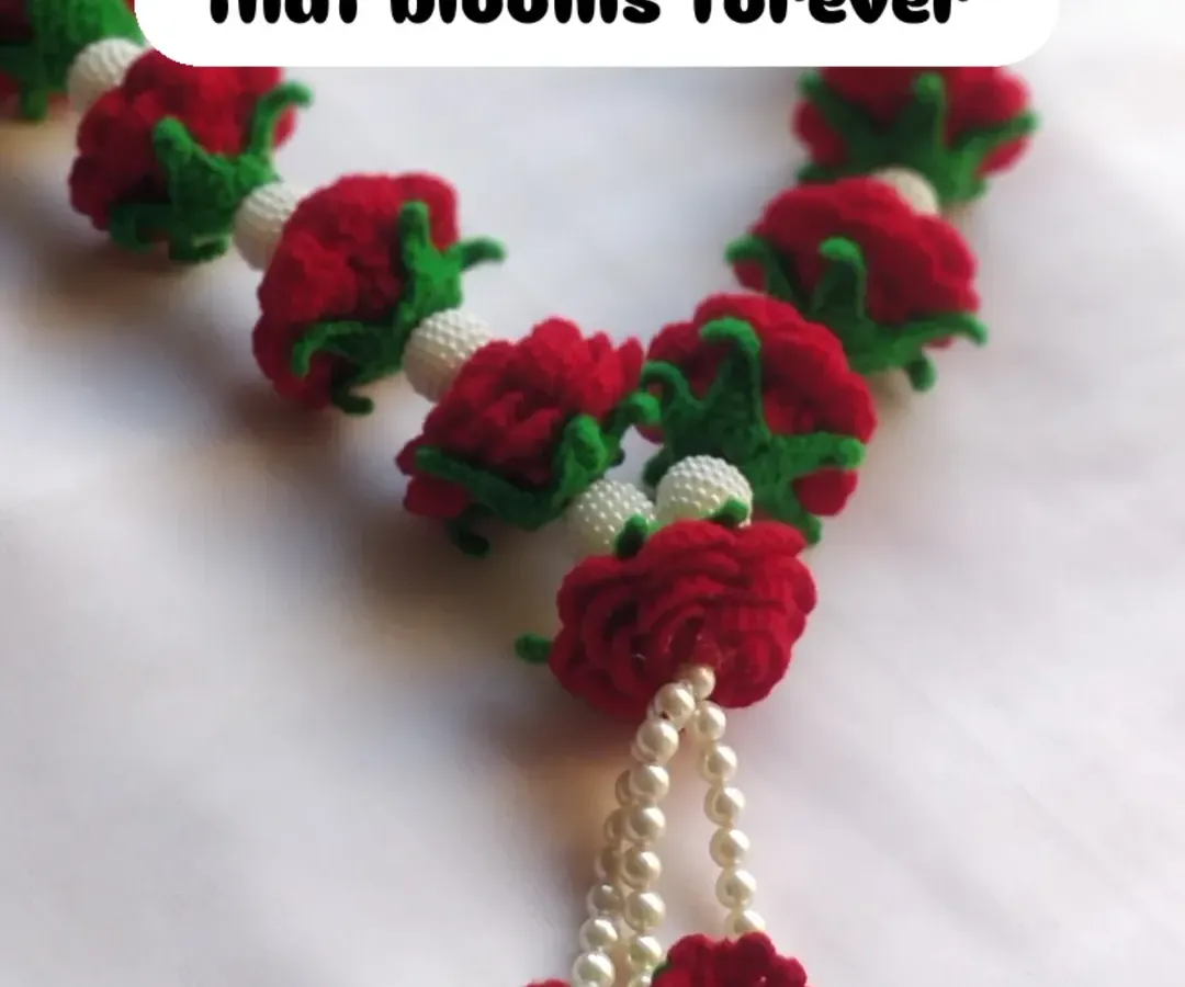My premium crochet rose garland is a piece that truly lasts forever. Each rose is crafted with vibrant red yarn and woven with delicate moti, making it a beautiful keepsake for weddings or to decorate your home mandir.