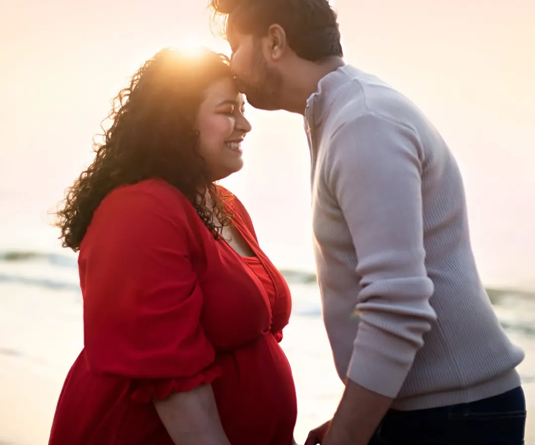 There's a special warmth in the golden hour light, perfect for capturing those quiet, tender moments between you and your partner. This is the love story that started it all, just before your new chapter begins.