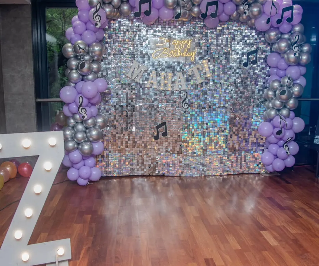 We transformed the venue into a dazzling disco for Mahati's 7th birthday! This sparkling sequin wall, complete with a custom neon sign and balloon arch, set the stage for a day of dancing and fun. We handle all the decor to make your theme come to life.