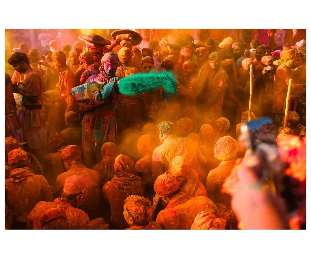 In the heart of the chaos during Holi celebrations in Nandgaon, a moment of pure energy. I strive to be in the middle of the action to capture the authentic, explosive joy of India's festival of colors.