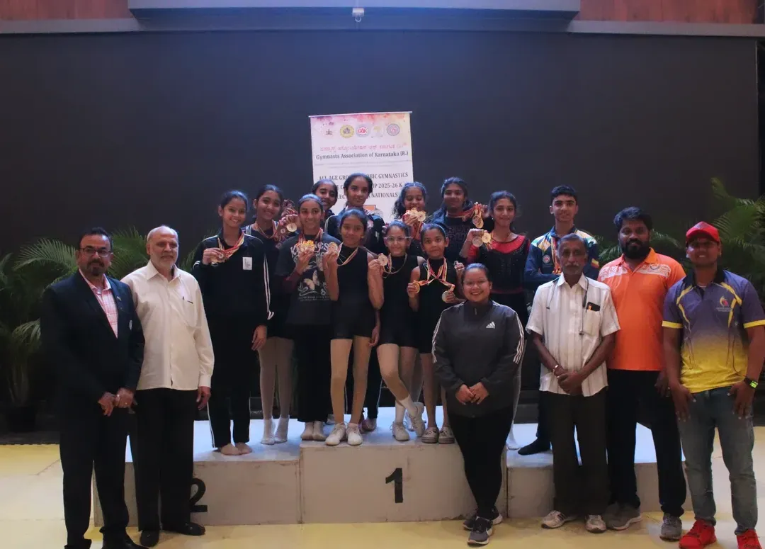 The result of dedication. Our aerobic gymnastics team celebrating their well-deserved wins at the State Championship. We don't just build gymnasts; we build champions.