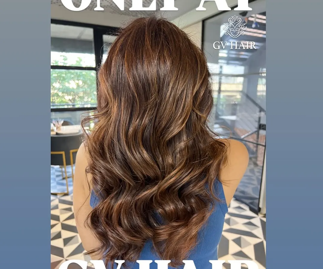 Let's talk about hair that gets you compliments. This is my signature balayage, creating rich, dimensional brunette waves that look effortlessly sun-kissed and feel incredibly healthy.