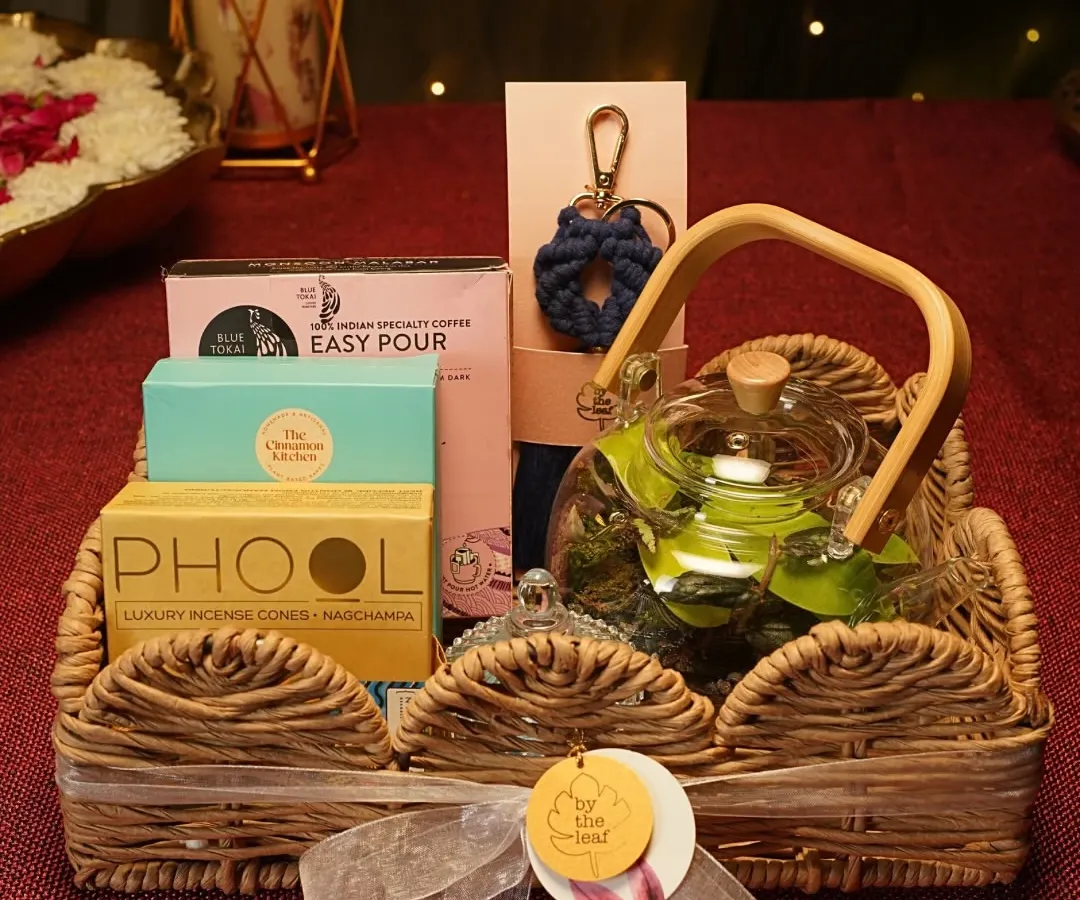 This is more than a gift, it's an experience. My curated festive hamper combines a living terrarium with other artisanal treats, all beautifully arranged in a rustic wicker basket for a truly memorable present.