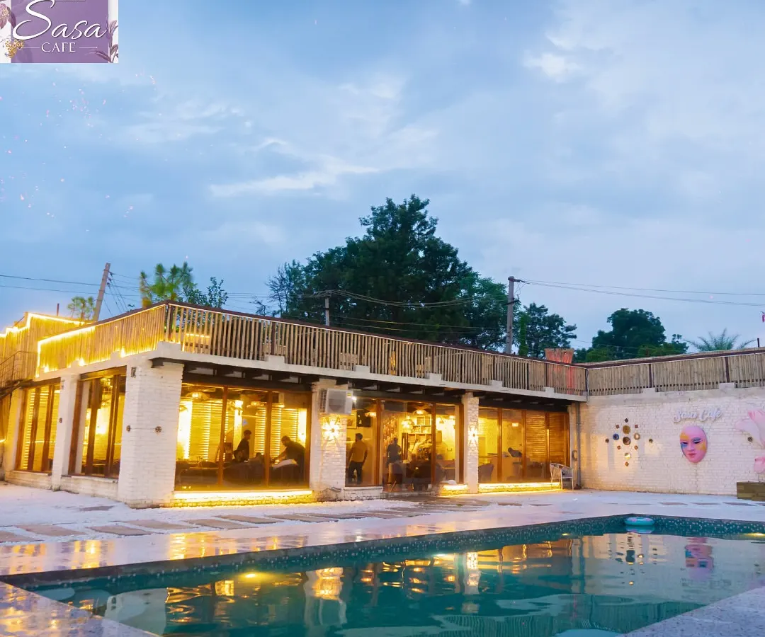 Welcome to your private escape. This is the view of Sasa Cafe from our poolside area at dusk, just as the lights start to create that magical glow. It’s a space I designed for you to leave the city chaos behind and just chill.