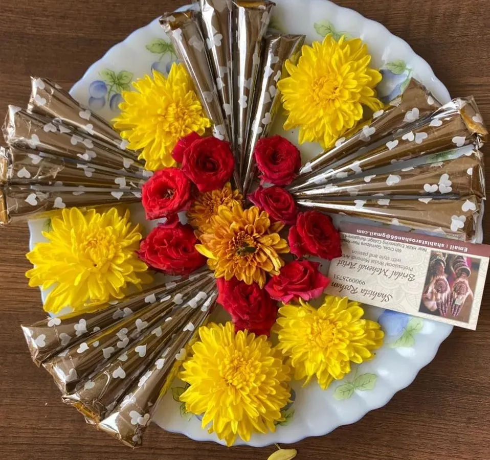 My handmade organic henna cones, ready for you. I arrange them on platters with fresh flowers for events or as special gifts, all prepared in Benson Town, Bangalore.