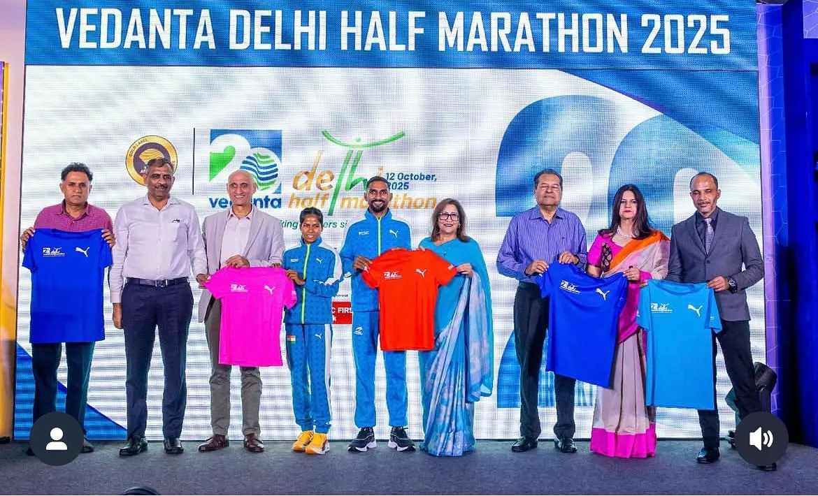 On stage for the Vedanta Delhi Half Marathon 2025 press launch. Organizing major city marathons requires professional collaboration with top sponsors and elite athletes. I handle these high-profile events to ensure a world-class experience for over 40,000 runners.