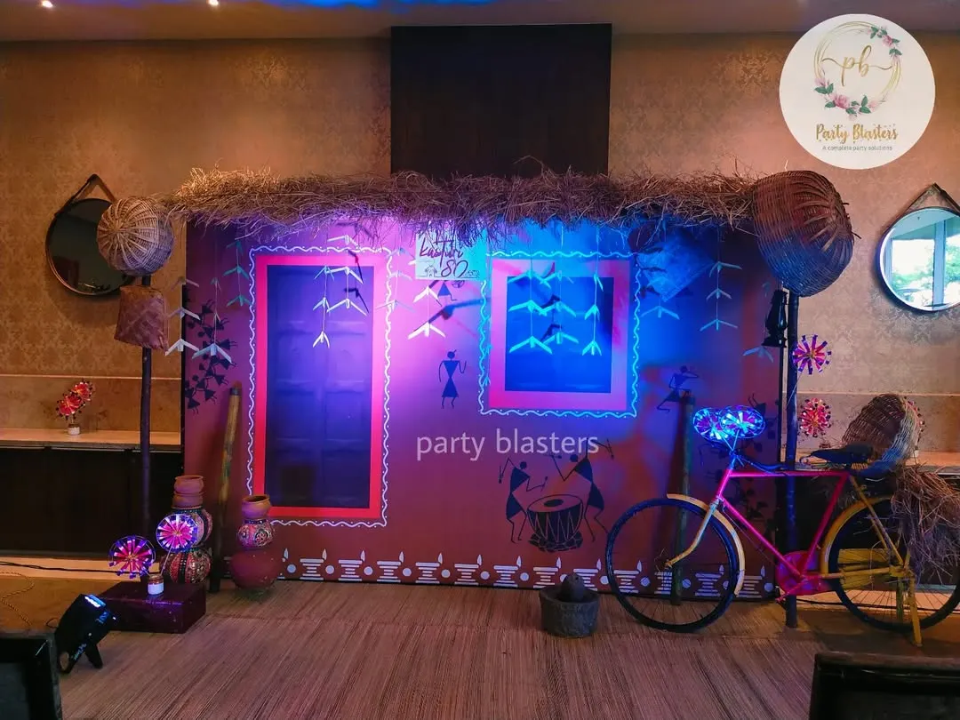 This immersive photo booth was the centerpiece of a corporate party with an Indian village theme. We used authentic materials like hay and woven baskets, combined with creative lighting and rustic props like a decorated bicycle, to create a memorable and interactive experience.