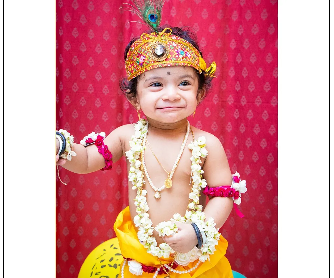 A joyful moment from one of my popular 'Little Krishna' themed photoshoots. I provide all the costumes and props to create these adorable and memorable portraits for your child.
