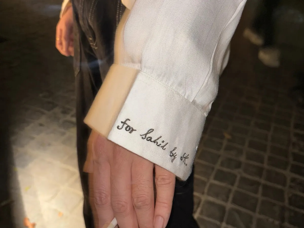 It's the little details that make an outfit truly yours. For this custom white shirt, I hand-embroidered the client's name on the cuff, a personal touch that sets bespoke menswear apart from anything off-the-rack.