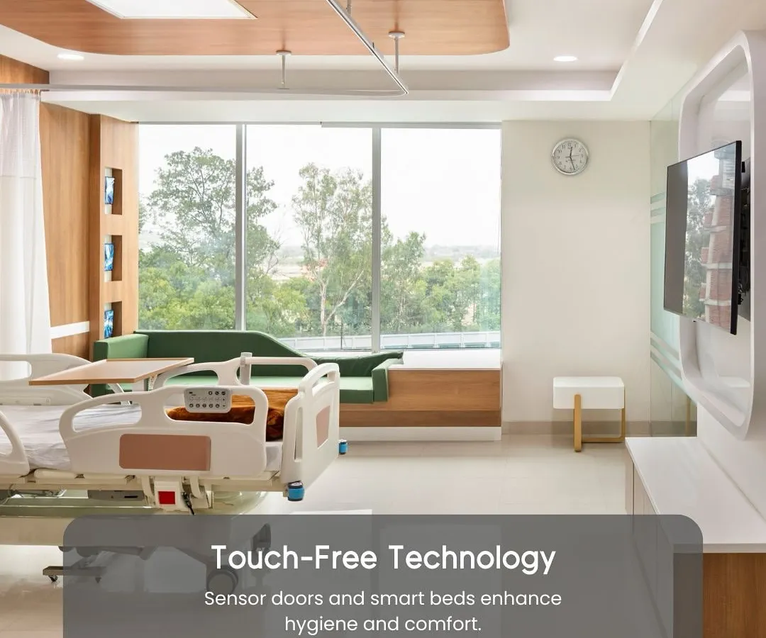 This patient room showcases our integration of touch-free technology, such as sensor doors and smart beds. These features enhance hygiene, improve patient comfort, and streamline care delivery, representing our commitment to creating safer and more efficient healing spaces.