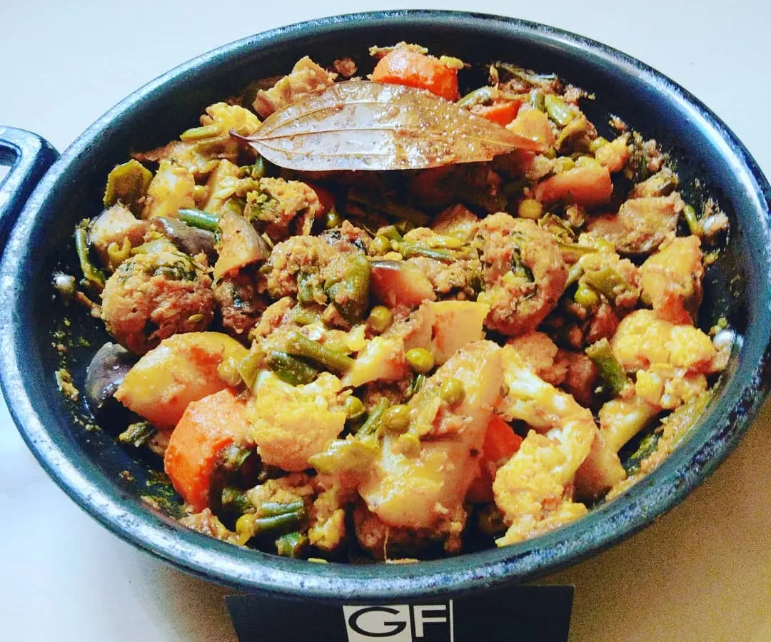 My signature Undhiyu, a traditional Gujarati winter vegetable curry. I cook it slowly with fresh vegetables and spices, making it a favorite for party catering and special family meals.