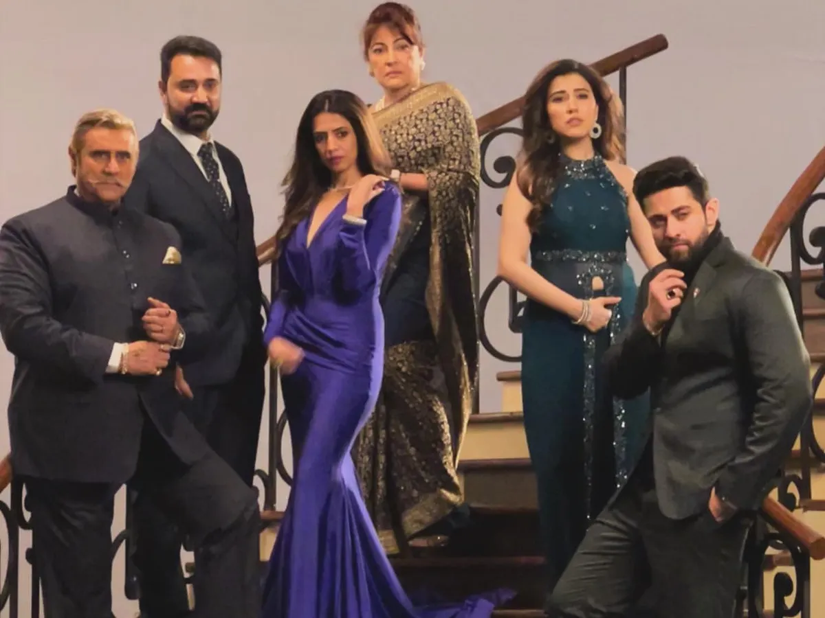 The full cast from the poster shoot for the TV drama "Vanshaj". I styled the leading ladies in these grand, elegant gowns to reflect the show's theme of legacy and opulence, using rich colors like royal purple and deep teal.