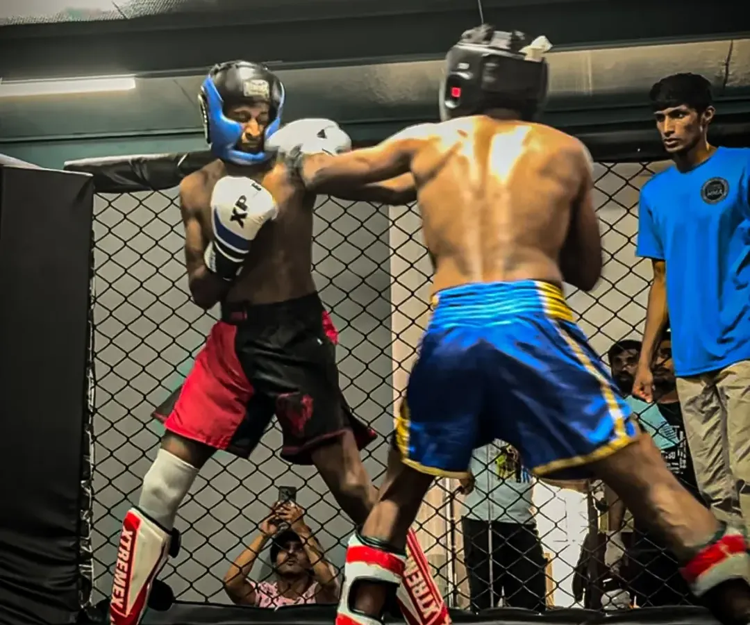 This is the moment of truth. Inside the cage, it's just you, your opponent, and your training. We prepare our fighters for this moment with intense, realistic kickboxing and MMA sparring sessions, focusing on technique, composure, and relentless pressure.