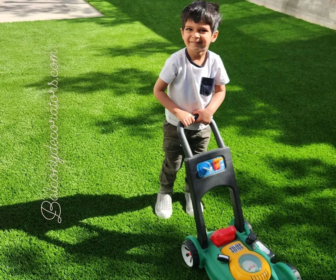My artificial grass isn't just for looks; it's a safe and clean play area for your bachhon. It's soft, durable, and completely mess-free, so you can let them play without any jhanjhat.