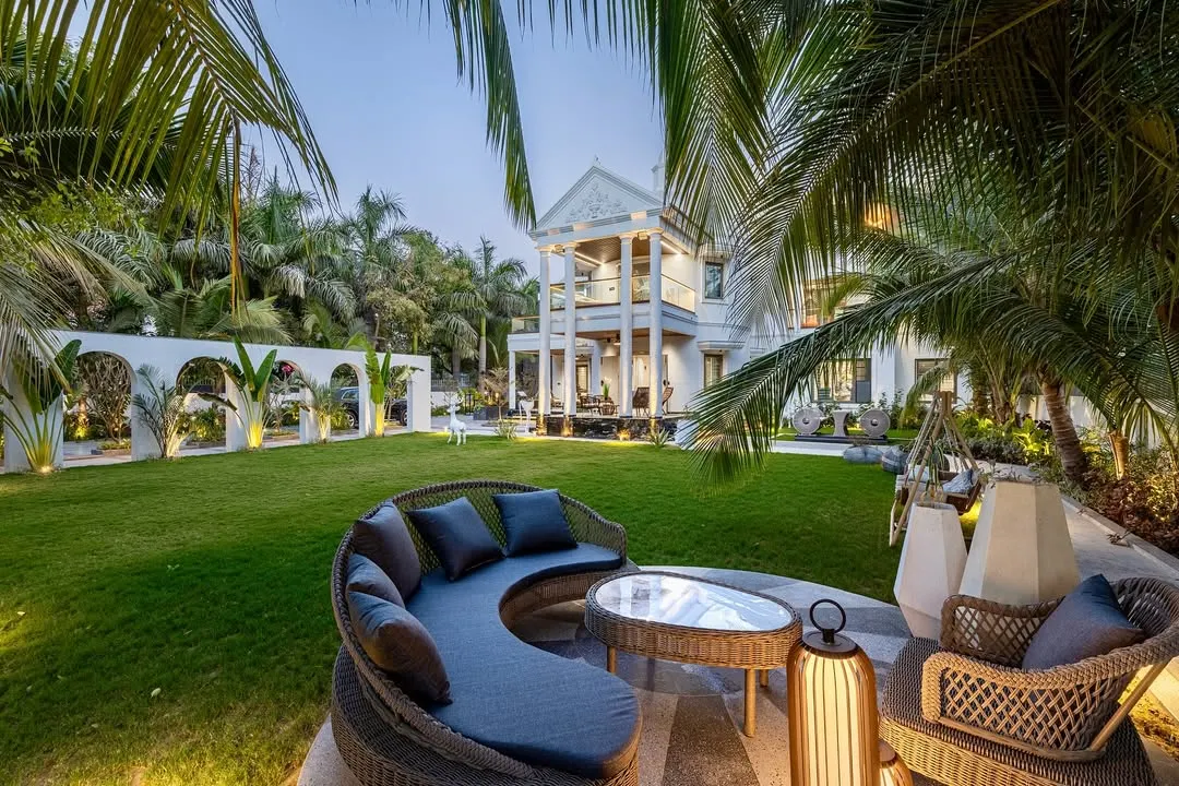 At the Tropical Manor, I designed this circular deck as a serene escape nestled within a grove of coconut palms. The ambient lighting and modern gothic architecture create a mood of grounded grandeur, offering a perfect spot to unwind and connect with nature.