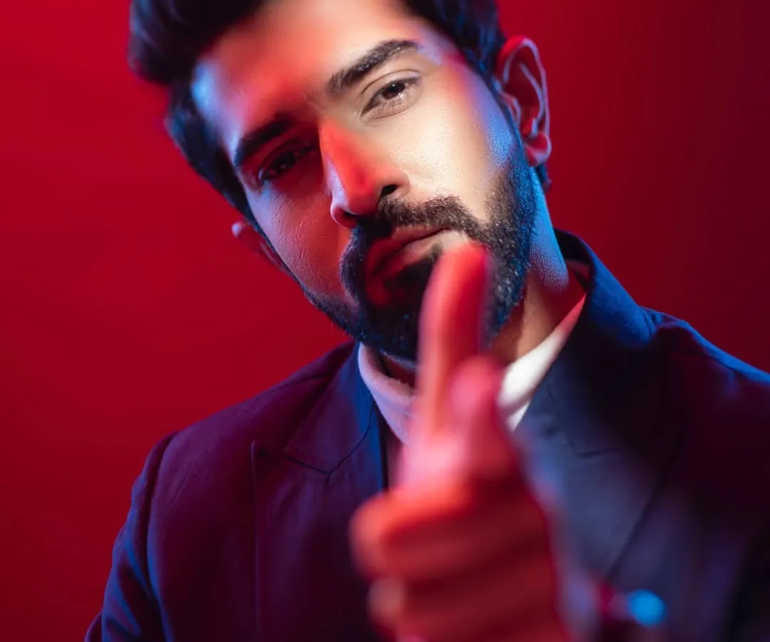 I love creating moody, cinematic portraits for actors. Here, I used a combination of red and blue gel lights to sculpt the face and create a sense of intensity and confidence. This style of actor headshot is great for showcasing a dramatic range and making a strong impression.