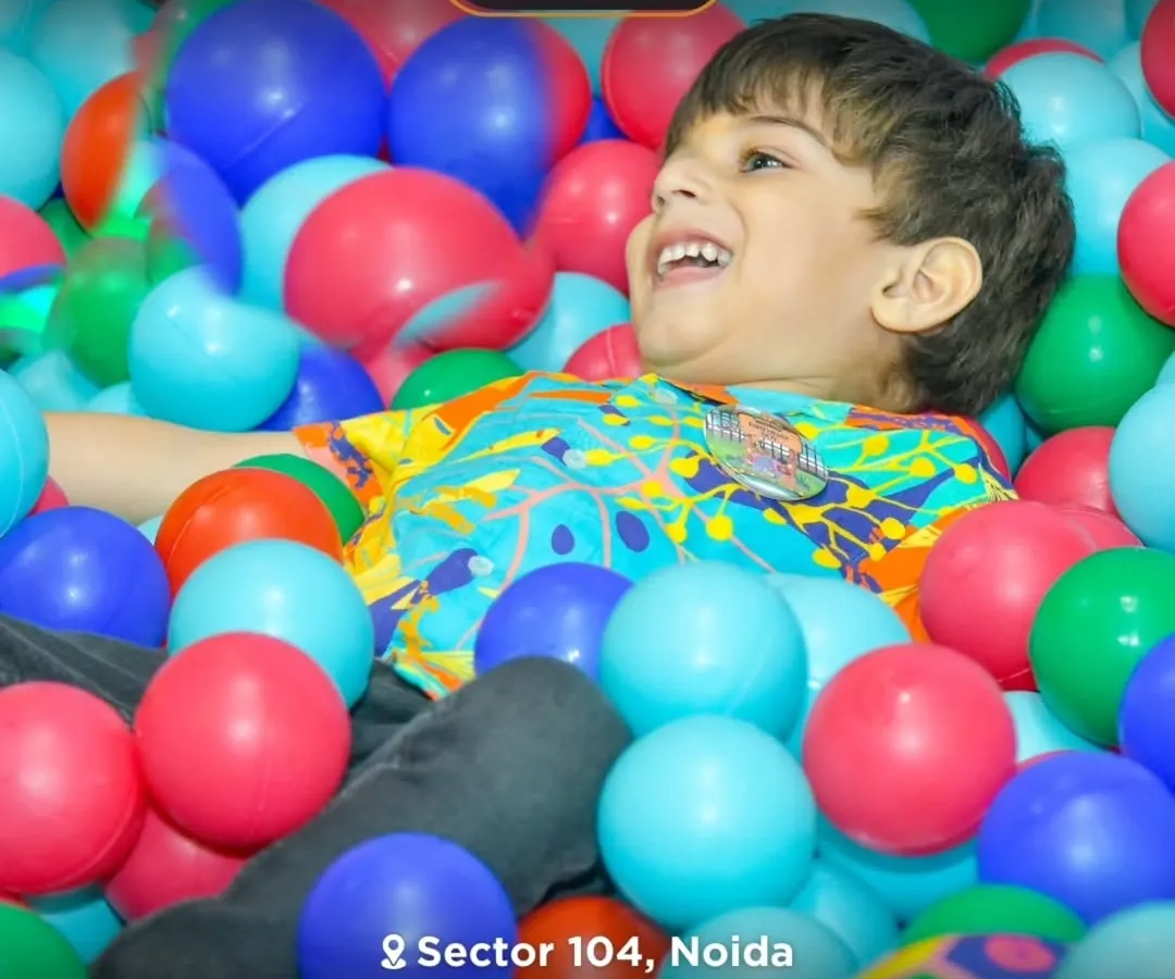 This is the look of pure joy I love to see. Our colorful ball pit is a favorite spot for kids to dive in, laugh, and just be kids in a safe and fun environment.