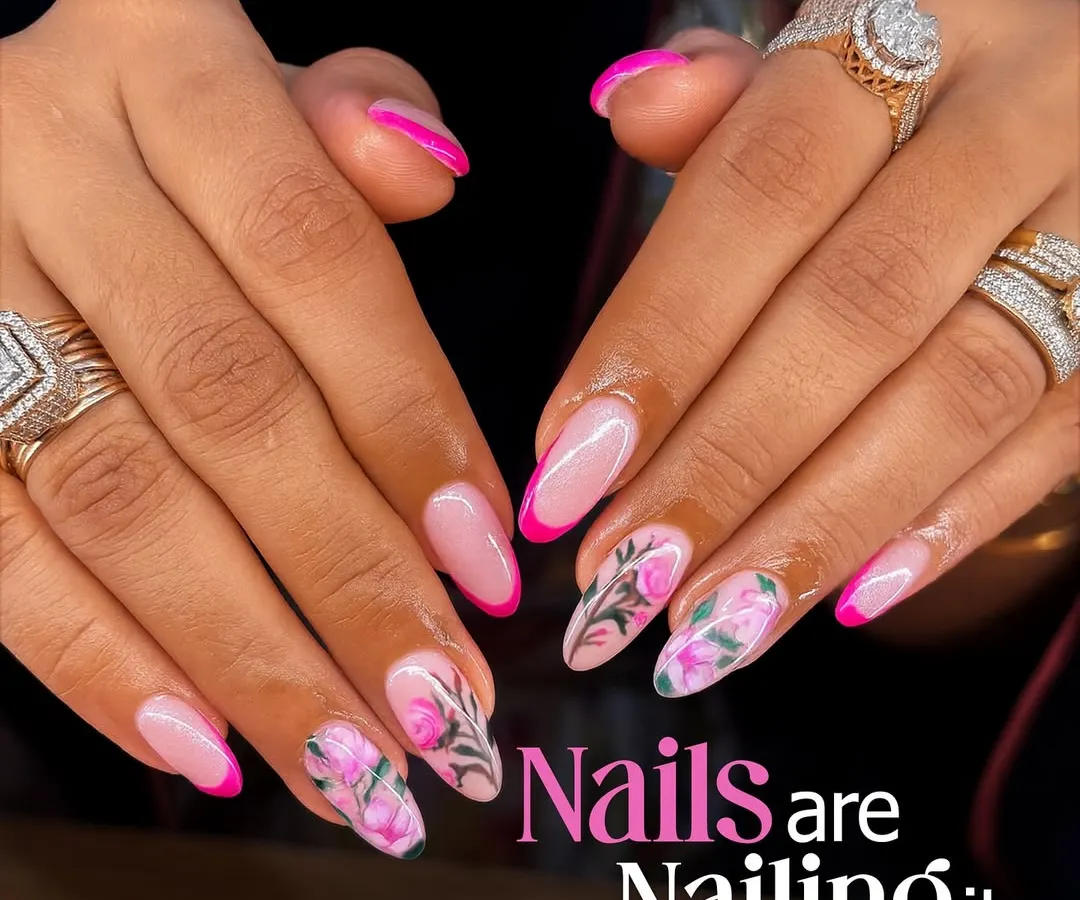 A closer look at our hand-painted floral nail art. This design combines a vibrant pink French tip with delicate, detailed rose patterns, showing my skill in creating bespoke and artistic manicures.