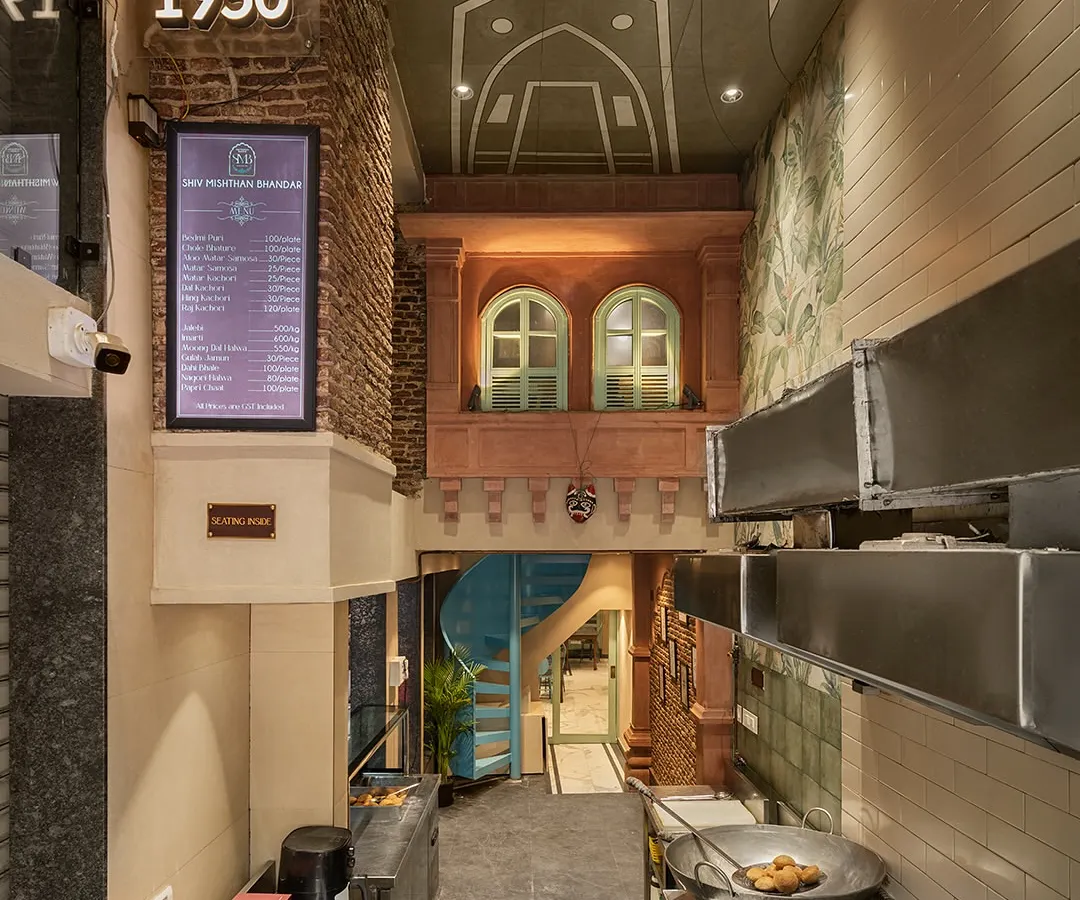 For this 75-year-old restaurant in Old Delhi, I created a double-height space that blends traditional aesthetics with modern functionality. The design features a prominent jharokha and exposed brick, paying homage to the area's heritage while revitalizing the brand's identity.
