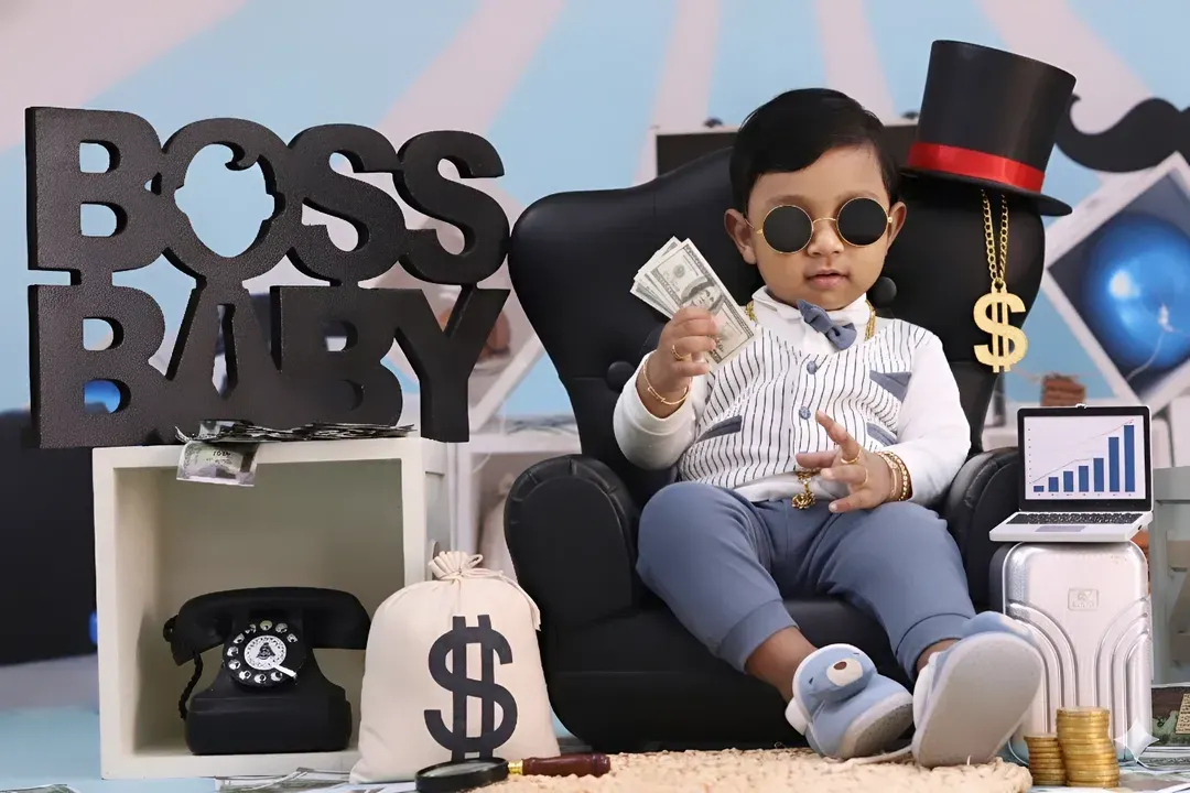 Our popular 'Boss Baby' theme is perfect for showing off your little one's big personality. We style the session with fun props like a tiny CEO chair, play money, and a vintage telephone to create a playful and memorable scene.