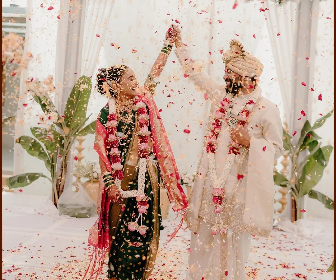 There is nothing more magical than the 'akshata' ceremony, where the couple is showered with blessings and flower petals. This is the moment a new life begins together, and I make sure to capture its pure joy.