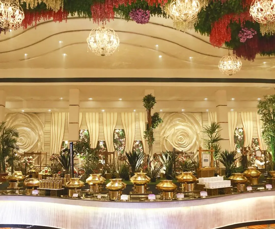Imagine your wedding feast set under a canopy of flowers and crystal chandeliers. We design grand, opulent buffet displays that are not just meals, but stunning centerpieces for your celebration, promising a feast for the eyes and the palate.