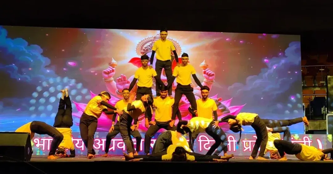This is a glimpse of the incredible skill and teamwork our students develop. This human pyramid formation was part of a performance at Talkatora Stadium, showcasing advanced acro yoga and the power of community.