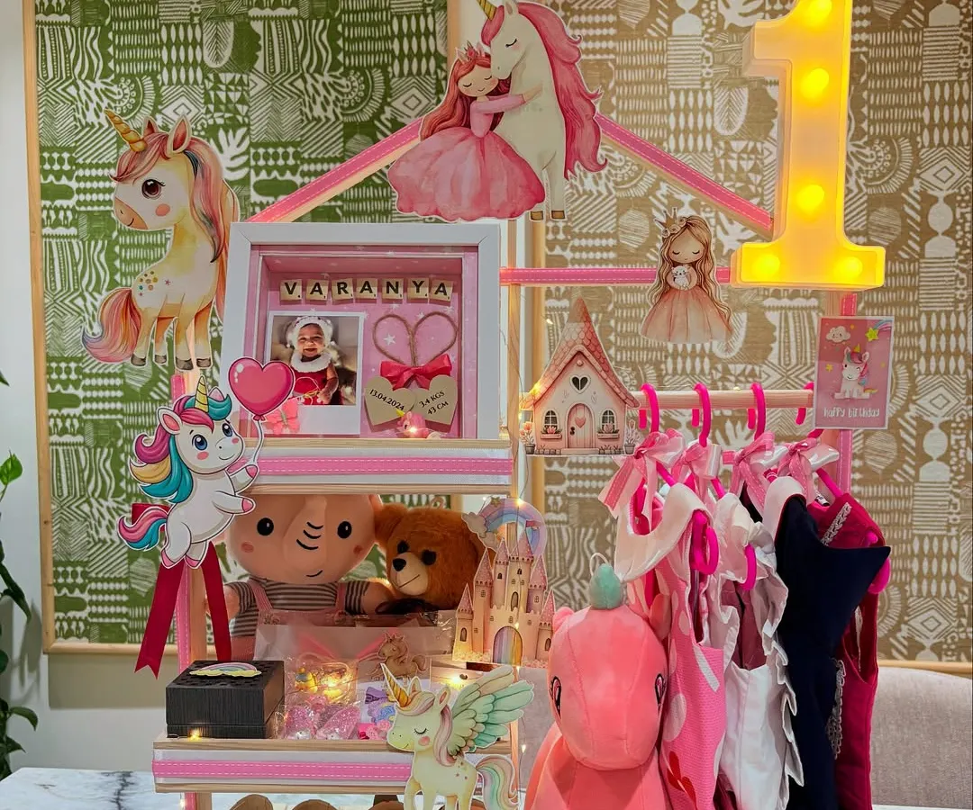 For a little princess turning one, I created this unicorn wonderland. This hamper, a special request from a loving nani, features everything from tiny frocks and booties to a personalized frame, all designed to make her first birthday a fairytale.