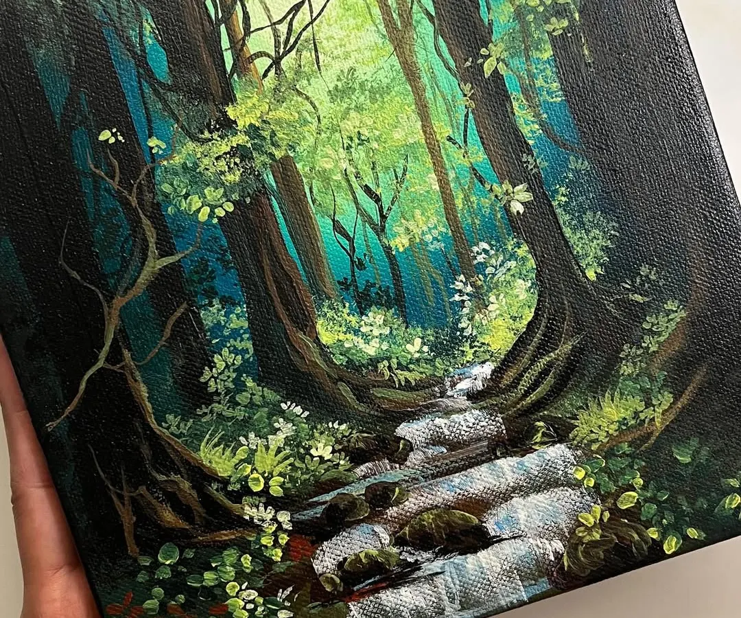 I love capturing the feeling of a secret forest stream. This acrylic on canvas piece shows a quiet moment with sunlight filtering through the trees and water flowing over mossy rocks.
