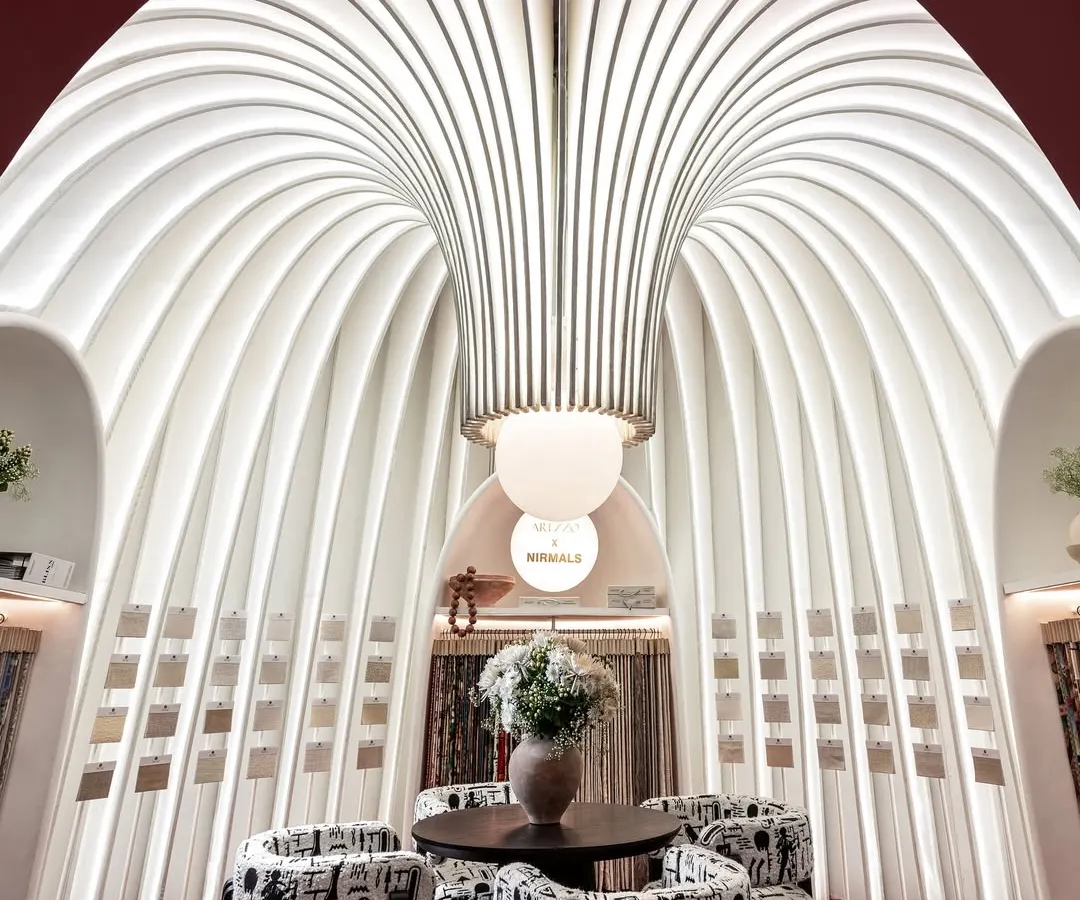 This was our ode to the silent power of fabric. For this award-winning exhibition booth, we sculpted a sanctuary from sheer white fins and soft light, creating a space that felt like walking through a poem. The structure itself became the art, inviting visitors into a serene, elegant world.